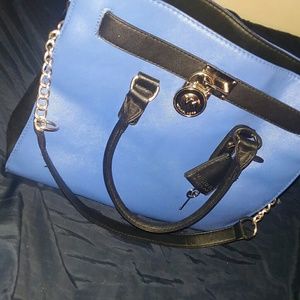 blue and black Michael kors purse